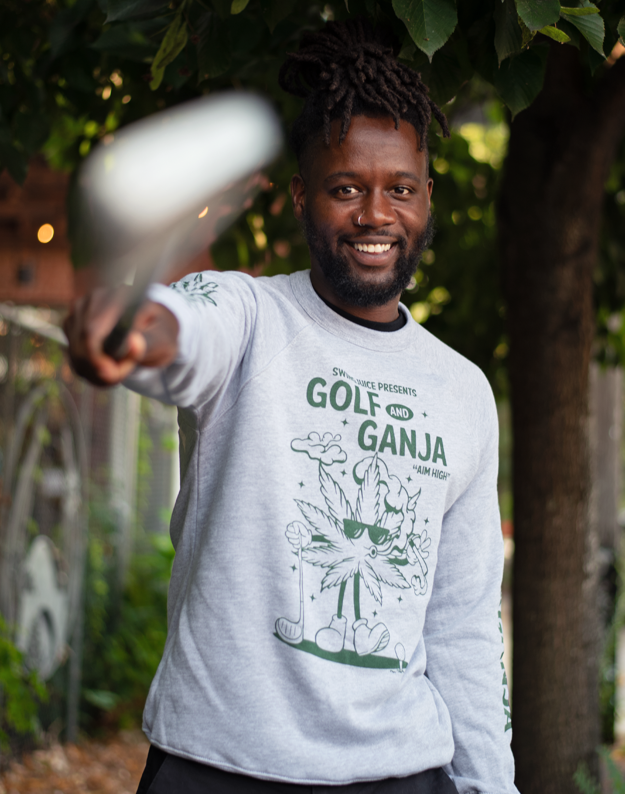 https://www.gun-ammo.com/wp-content/uploads/A0004/gunsphoto-2/mancaveandapparel-1/01-swingjuice-long-sleeve-unisex-sweatshirt-golf-ganja-grey.png