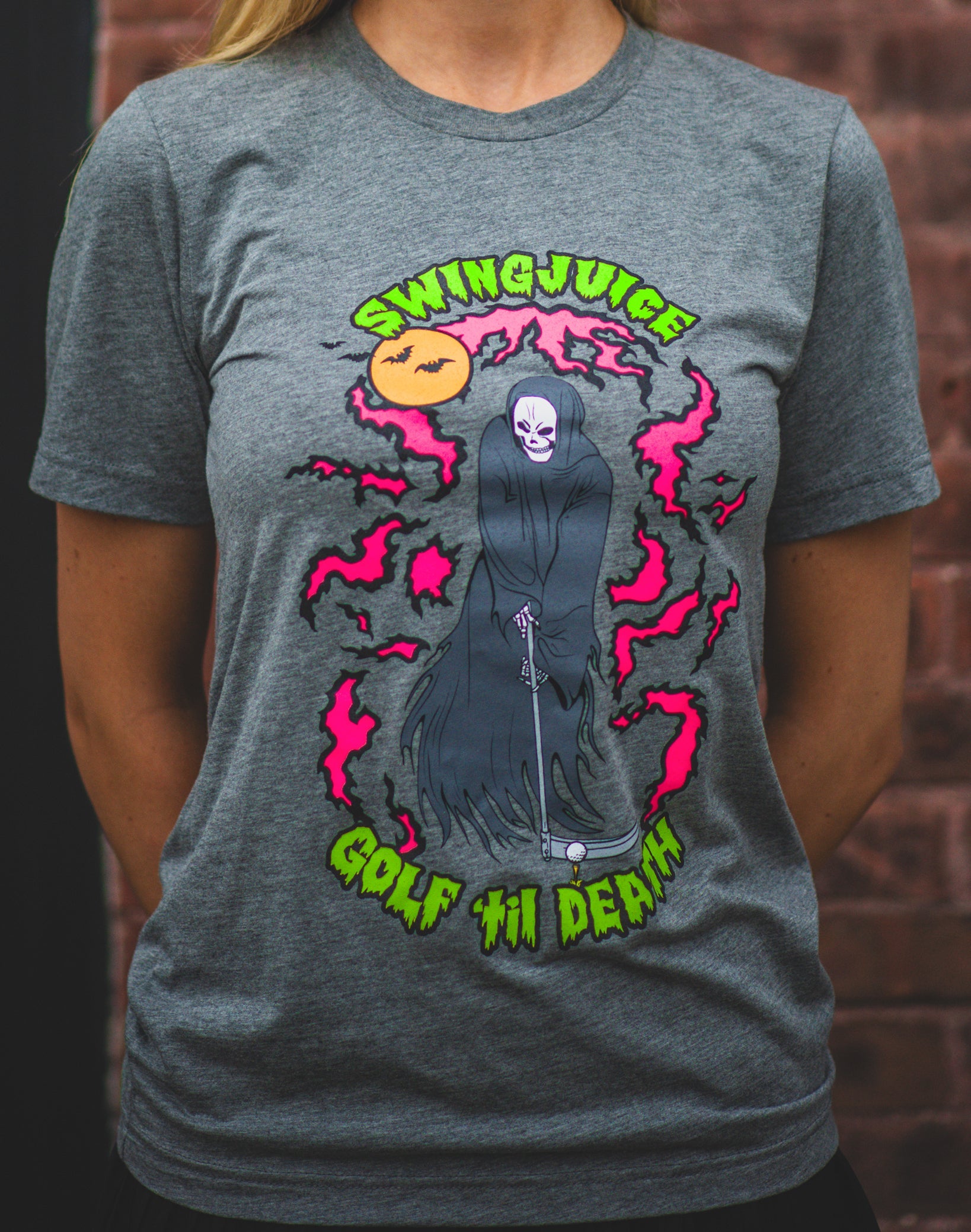 https://www.gun-ammo.com/wp-content/uploads/A0004/gunsphoto-2/mancaveandapparel-1/1-swingjuice-golf-reaper-unisex-short-sleeve-tee-girl-grey.jpg