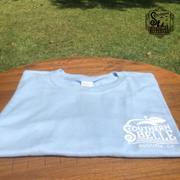 https://www.gun-ammo.com/wp-content/uploads/A0004/gunsphoto-2/mancaveandapparel-1/Southern_Belle_Light_Blue_front_655707a6-080e-4f94-a662-f0b56eedc2bb.png